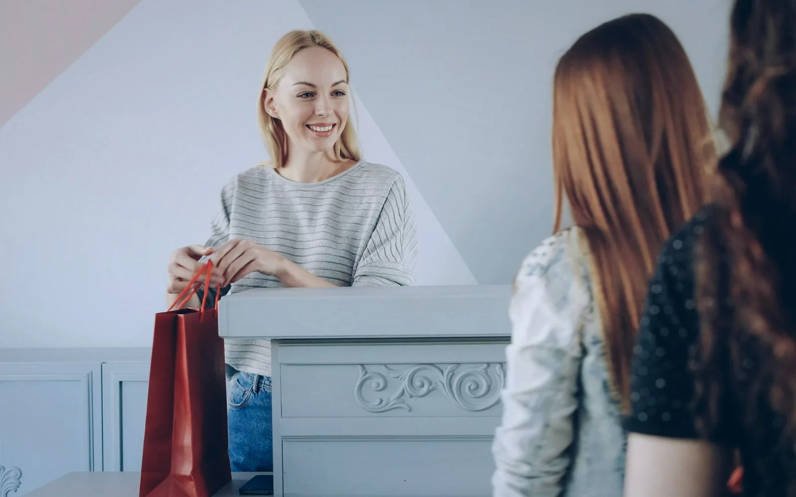 Retail counter handover used to represent same-day shop collections